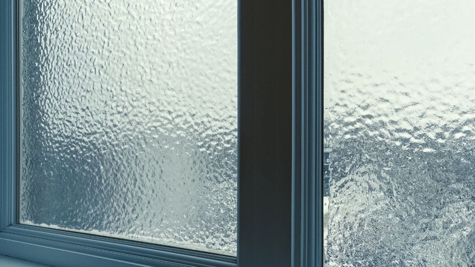 (In the image a window frosting design can be seen enhancing privacy and showcasing a stylish look)