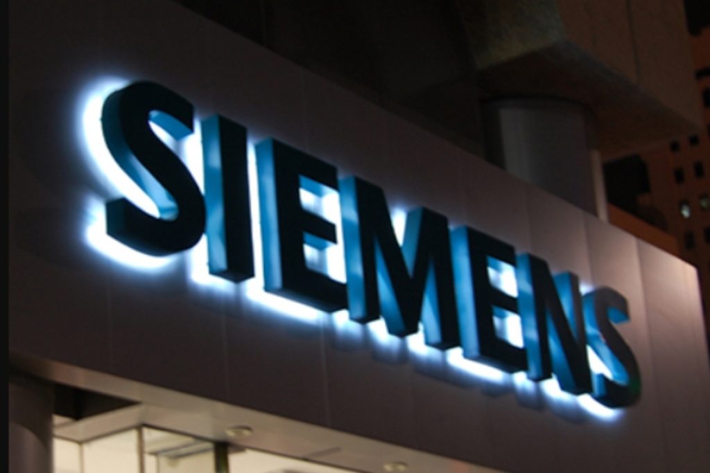 A large informational sign on a stand positioned in a lobby area, providing guidance to visitors. weatherproof outdoor signs